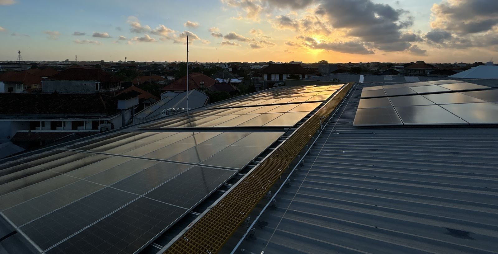 Rooftop solar array at sunset installed by Soliva